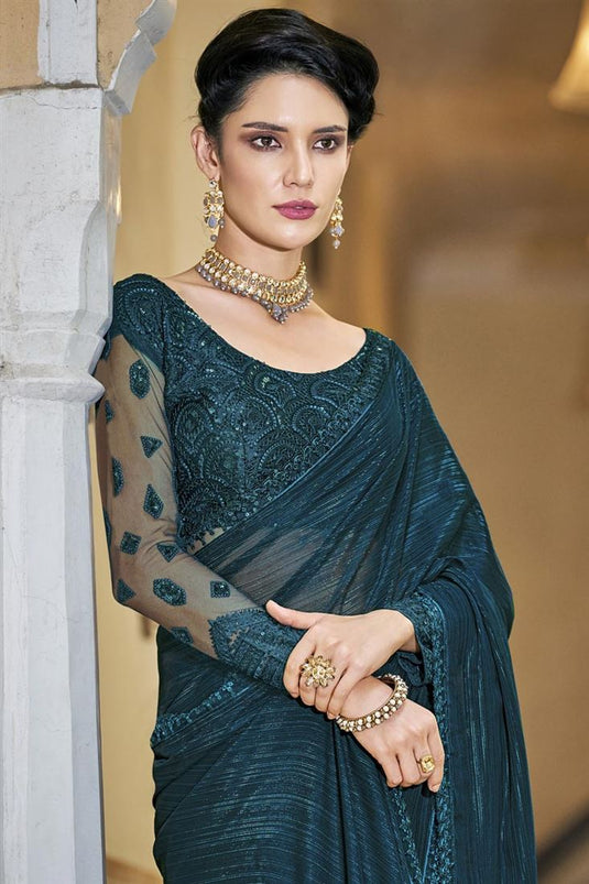 Chiffon Fabric Sequins Work Wonderful Party Style Saree In Teal Color