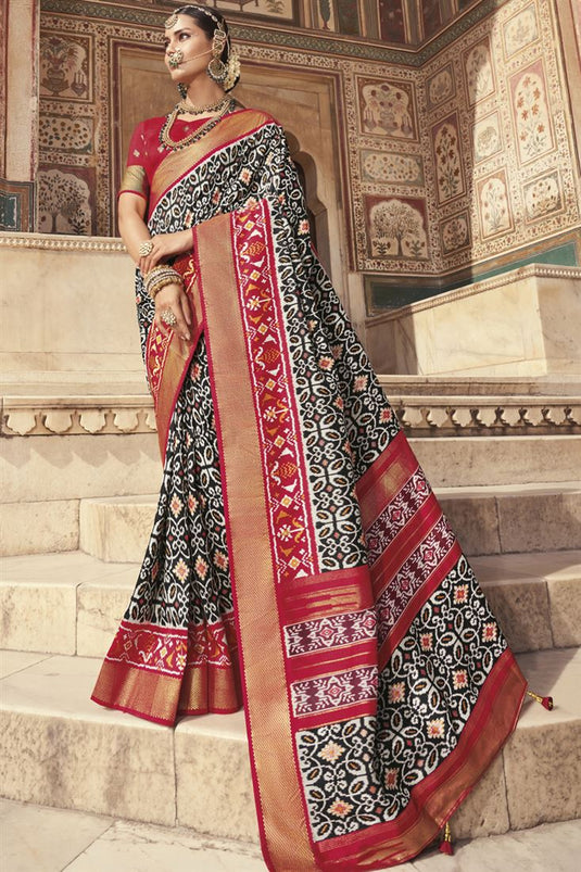 Patola Silk Black And White Color Intriguing Printed Saree