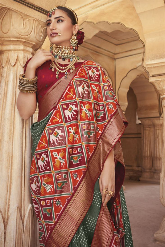 Patola Silk Olive Color Intriguing Printed Saree