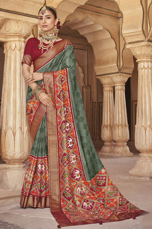 Patola Silk Olive Color Intriguing Printed Saree