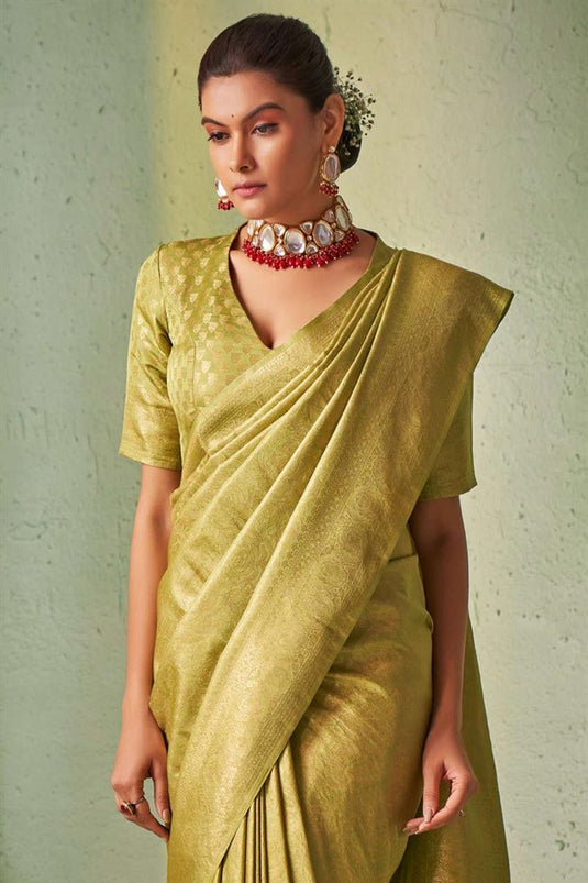 Tempting Olive Color Kanjivaram Silk Saree with Weaving Work