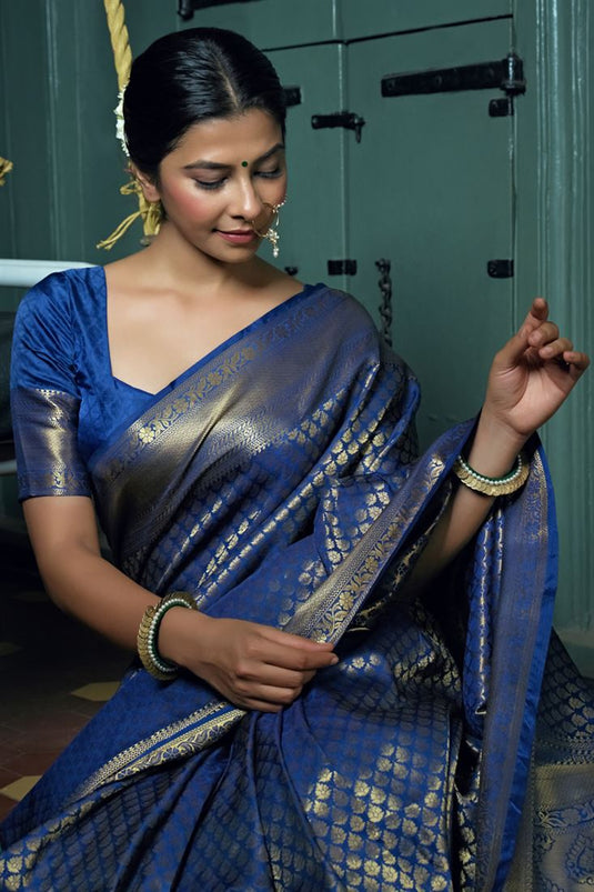 Weaving Work On Dazzling Kanjivaram Silk Saree In Blue Color