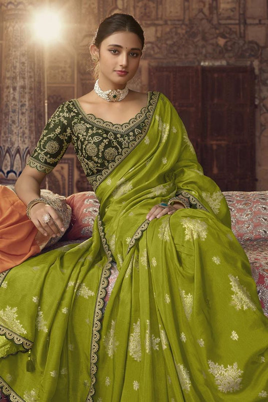 Tempting Viscose Fabric Green Color Saree With Embroiderd Work