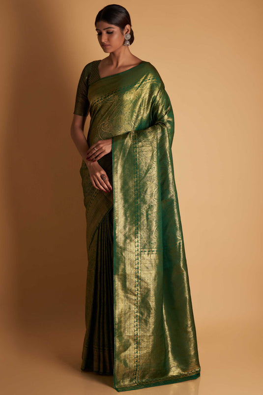 Wedding Wear Two Tone Kanjivaram Silk Fabric Weaving Work Saree In Dark Green Color