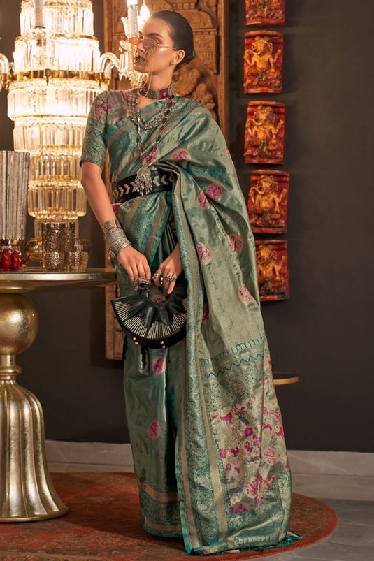 Glamorous Teal Color Weaving Designs Silk Saree