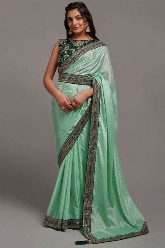 Traditional Chinon Fabric Sea Green Color Saree with Border Work