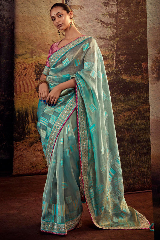 Cyan Color Fancy Work Art Silk Fabric Charming Look Saree