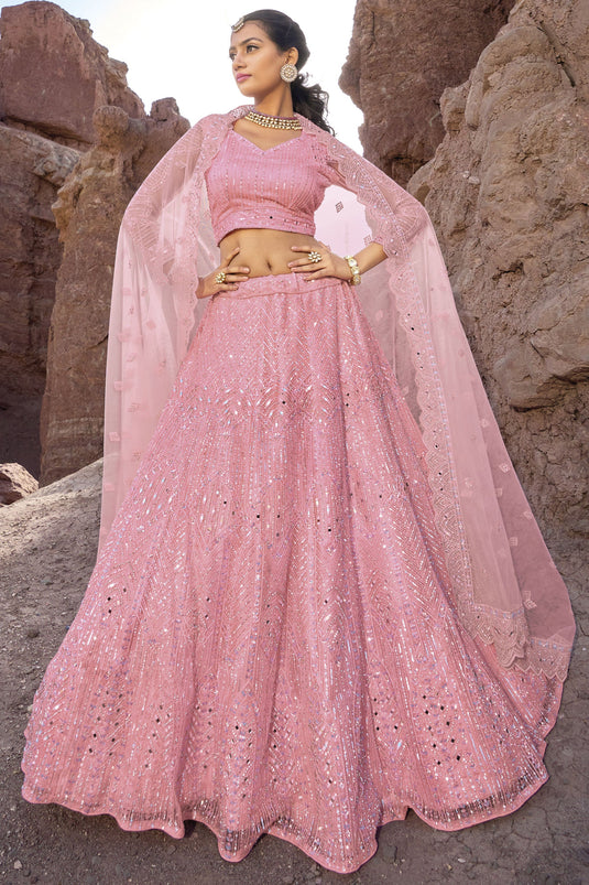 Net Fabric Bridal Lehenga Choli With Fancy Work In Pink Color