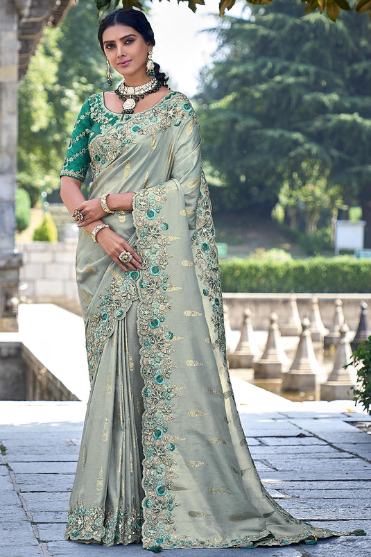 Excellent Silk Sea Green Color Saree With Heavy Embroidered Blouse