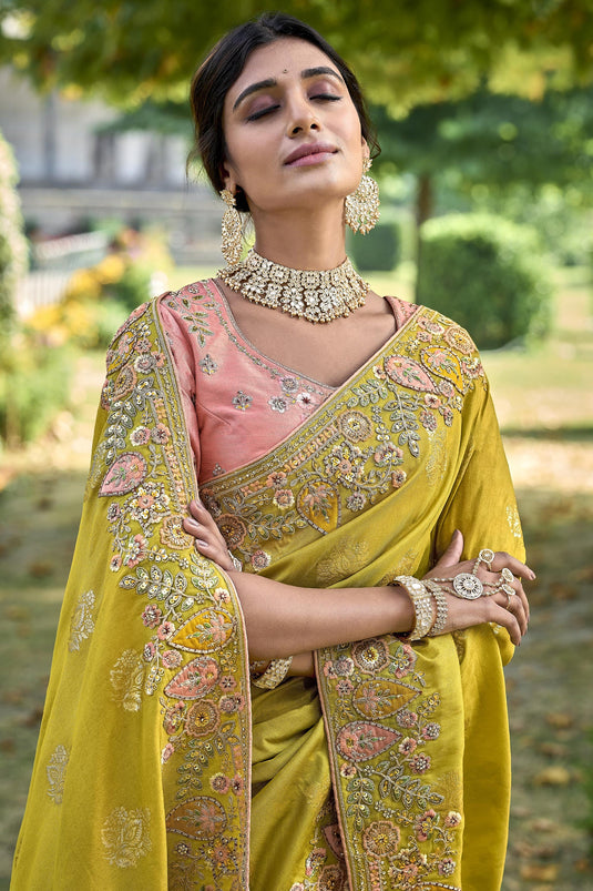 Dazzling Mustard Color Silk Saree With Heavy Embroidered Blouse