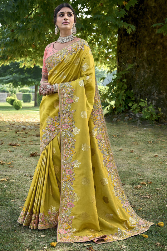 Dazzling Mustard Color Silk Saree With Heavy Embroidered Blouse