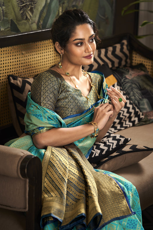 Appealing Weaving Designs On Festive Look Art Silk Saree In Cyan Color