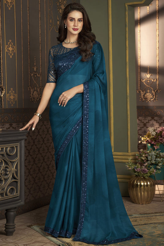 Teal Color Chiffon Silk Fabric Coveted Sangeet Wear Saree With Border Work