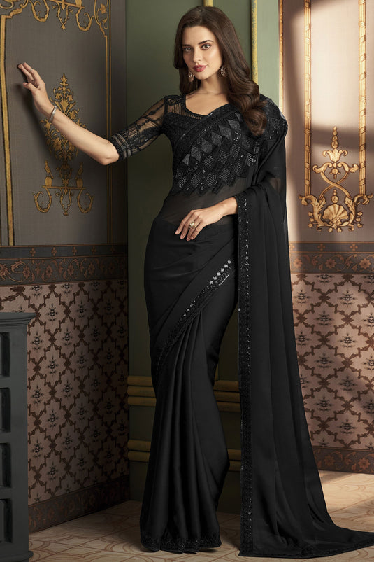 Excellent Chiffon Silk Fabric Black Color Sangeet Wear Saree With Border Work