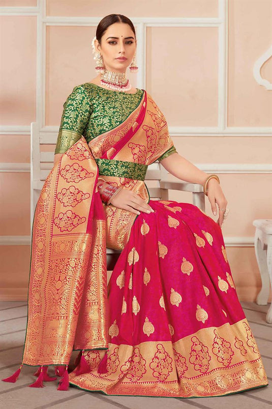 Beautiful Rani Color Banarasi Silk Saree With Weaving Work