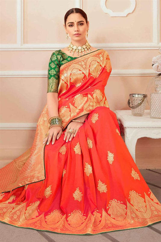 Elegant Weaving Work On Orange Color Festive Wear Banarasi Silk Saree