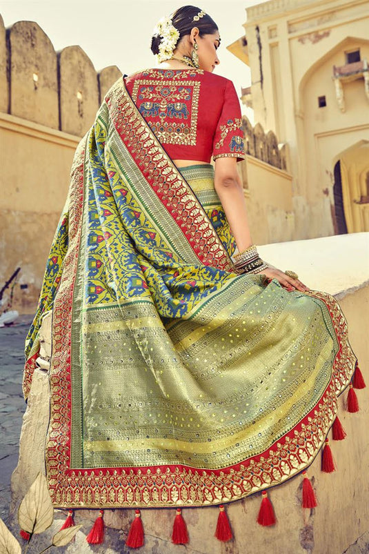 Dazzling Patola Style Silk Border Work Green Function Wear Saree