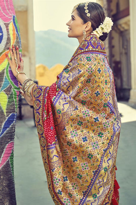 Engaging Border Work Sangeet Wear Red Patola Style Silk Saree