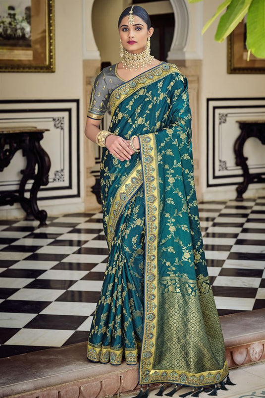 Elegant Wedding Wear Teal Color Banarasi Fabric Saree With Weaving Work