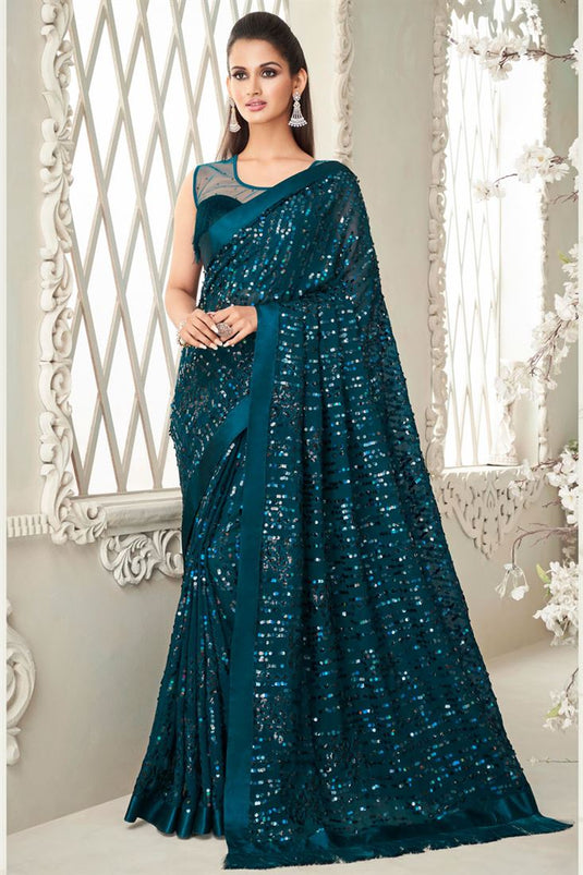 Georgette Fabric Party Look Mesmeric Sequins Work Saree In Teal Color