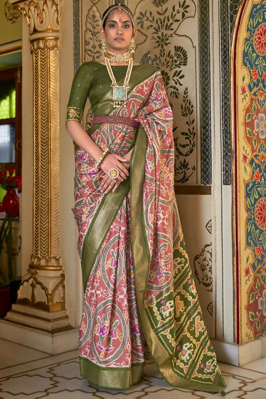 Soothing Art Silk Patola Printed Saree In Rust Color