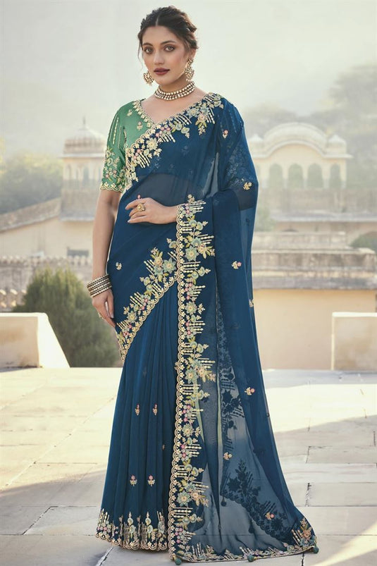 Function Wear Silk Fabric Teal Color Magnificent Embroidered Saree