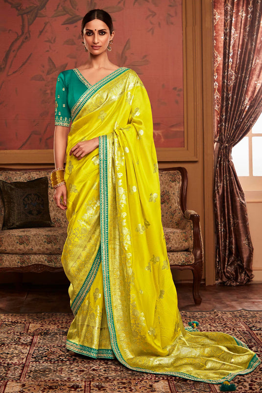 Dola Silk Fabric Yellow Color Weaving Work Festive Wear Trendy Saree