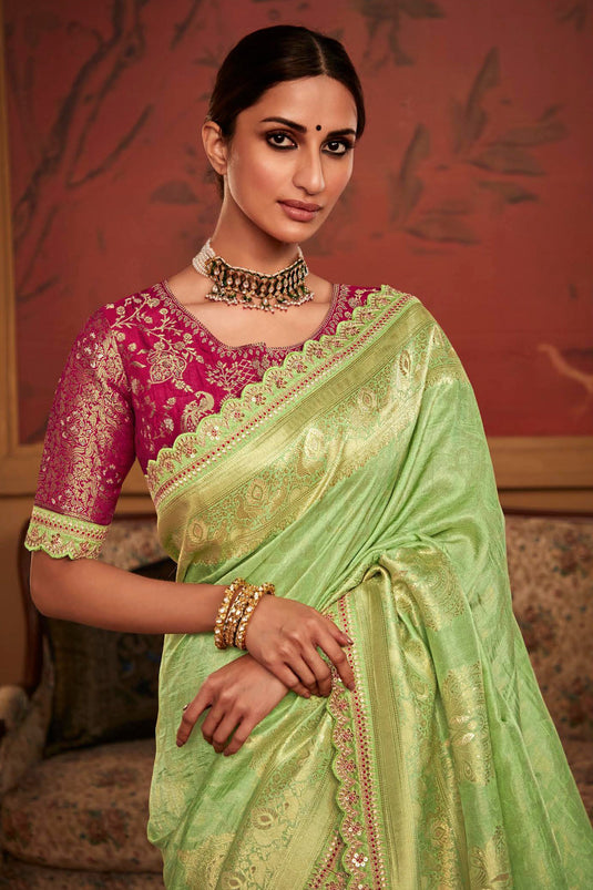 Green Color Reception Wear Trendy Weaving Work Saree In Dola Silk Fabric