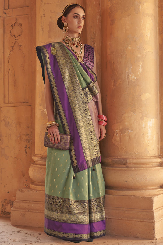 Weaving Print Kanjivaram Silk Fabric Sangeet Wear Sea Green Color Saree With Patola Design Blouse