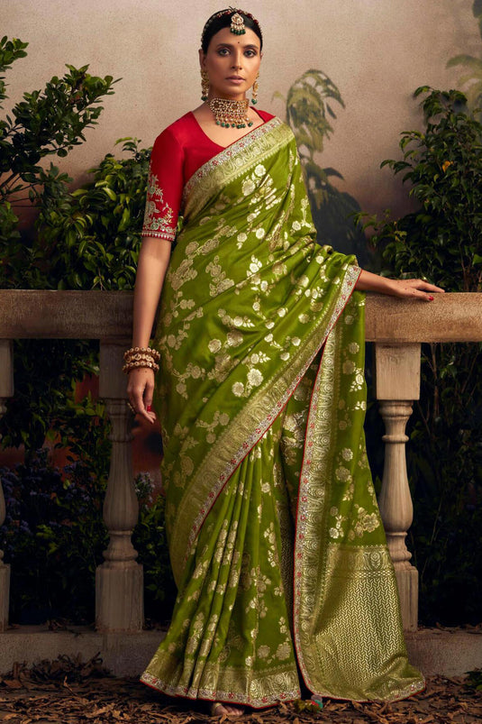 Glorious Look Weaving Work Art Silk Fabric Green Color Saree With Contrast Blouse