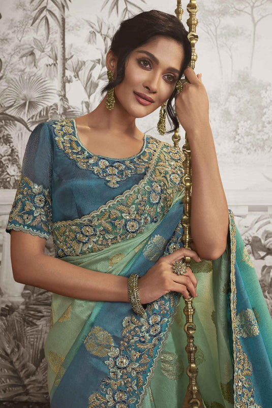 Imperial Sea Green Color Heavy Embroidery Work Fancy Fabric Saree With Party Look Blouse