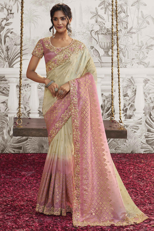 Heavy Embroidery Work Engaging Beige Color Fancy Fabric Saree With Party Look Blouse