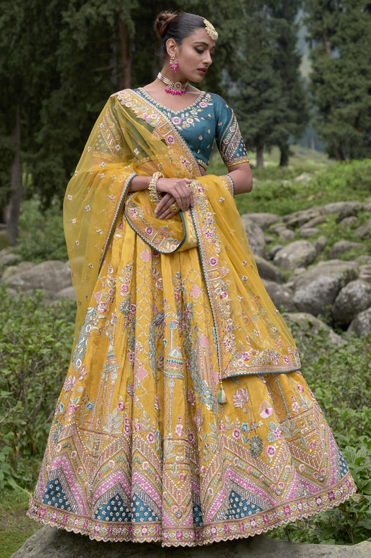 Yellow Color Viscose Fabric Heavy Embroidered Designer Bridal Lehenga Choli
