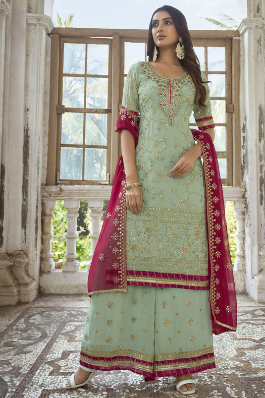 Sea Green Color Georgette Fabric Fancy Embroidered Function Wear Palazzo Salwar Suit