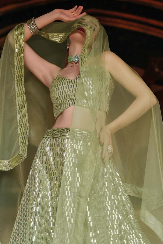 Sangeet Wear Net Fabric Khaki Color Sequins Work Extravagant Lehenga