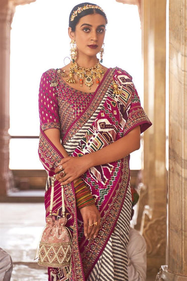 Patola Silk Fabric Printed Function Wear Mesmeric Saree With Semi Stitched Blouse In Rani Color