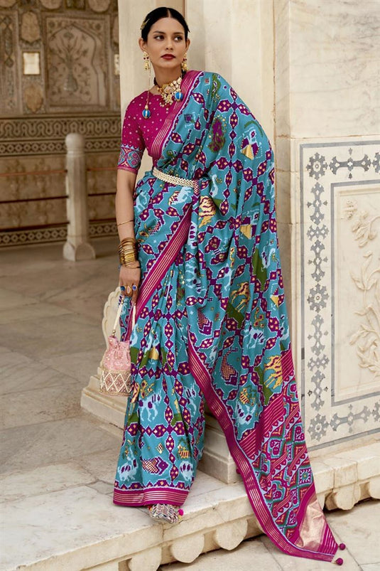 Cyan Color Art Silk Fabric Function Wear Luminous Patola Printed Saree
