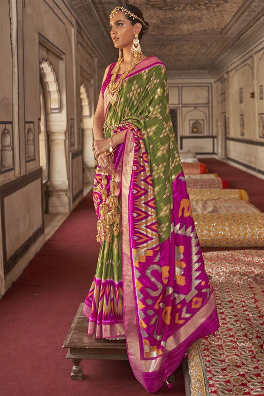 Patola Silk Fabric Green Color Function Wear Coveted Saree With Printed Work