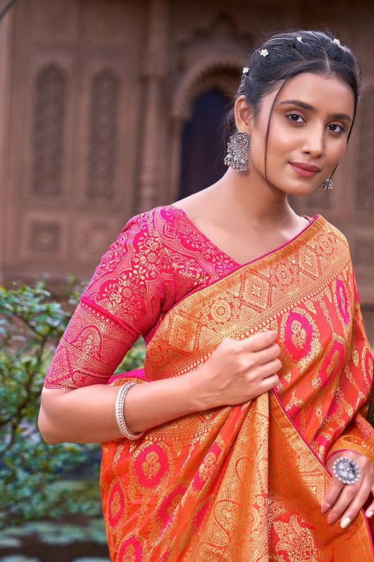 Banarsi Silk Fabric Embellished Weaving Work Orange Color Saree