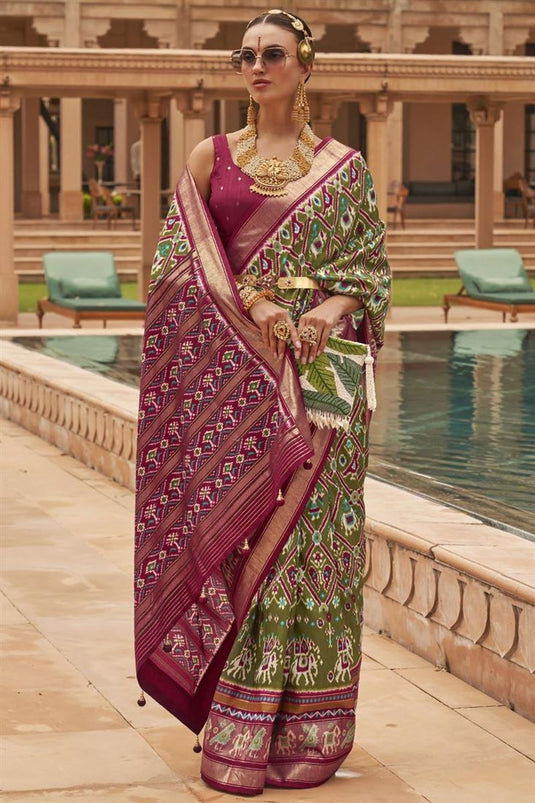 Green Color Engrossing Patola Saree In Art Silk Fabric