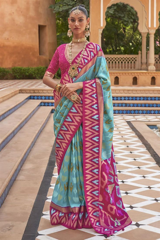 Excellent Art Silk Fabric Cyan Color Patola Saree With Printed Work