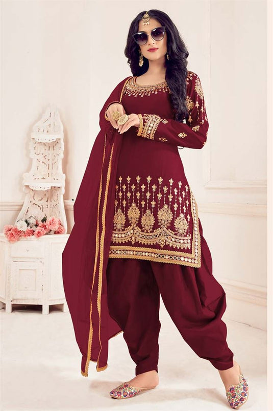 Maroon Color Art Silk Fabric Festival Wear Embroidered Riveting Patiala Suit