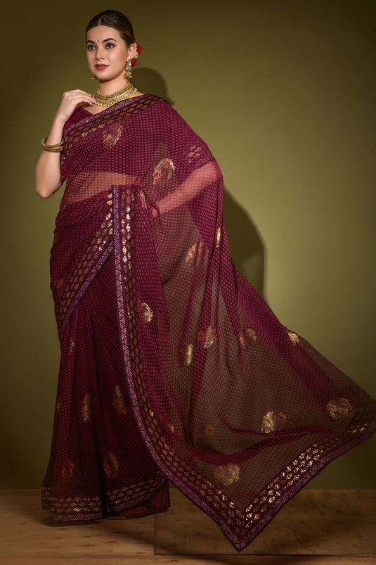 Gorgeous Georgette Wine Color Saree with Foil Print and Sequins Work