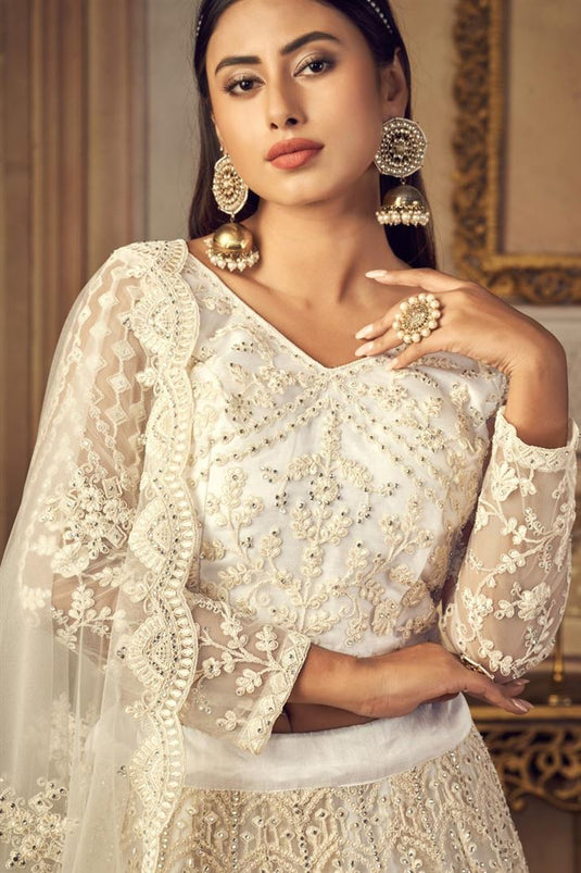 White Color Wedding Wear Attractive Embroidered Lehenga Choli In Net Fabric