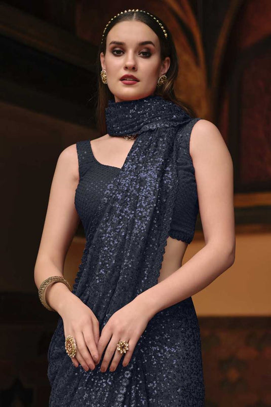 Navy Blue Color Georgette Fabric Gleaming Sequins Work Saree In Party Wear