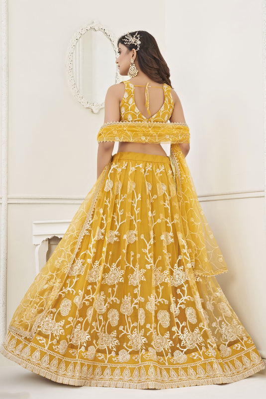 Yellow Designer Embroidered Lehenga Choli In Net Fabric With Alluring Blouse