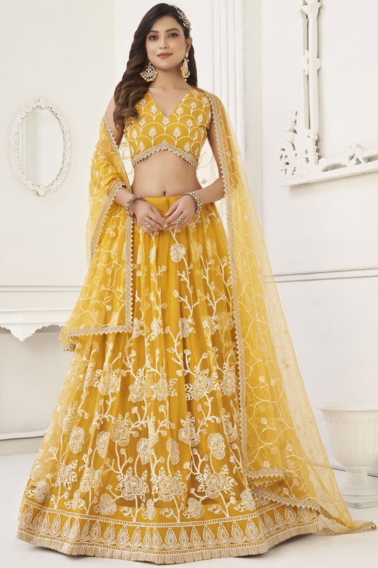 Yellow Designer Embroidered Lehenga Choli In Net Fabric With Alluring Blouse