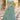 Net Fabric Ravishing Embroidered Lehenga In Sea Green Color