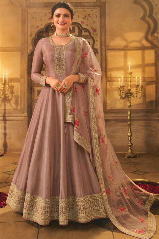 Prachi Desai Adorning Chikoo Color Sangeet Wear Art Silk Anarkali Suit