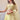 Net Fabric Sequins Work Luminous Lehenga In Cream Color